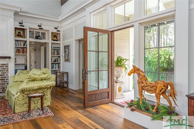 sitting room featuring hardwood / wood-style floors