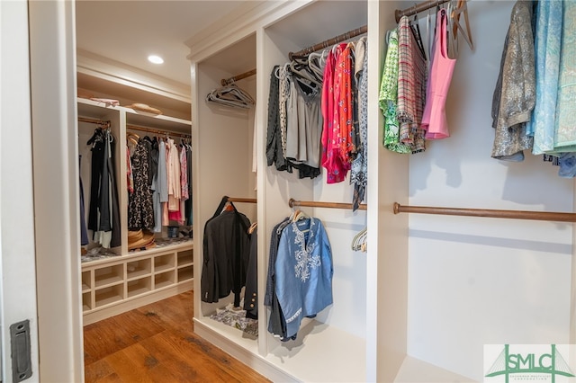 spacious closet with wood finished floors