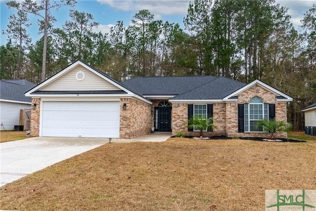 ranch-style home featuring a garage and a front yard