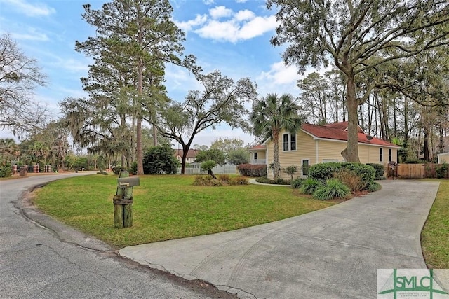 view of property exterior featuring a lawn