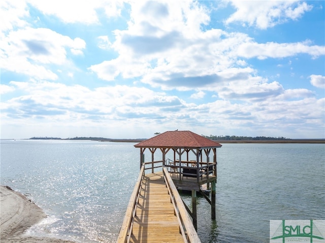 dock area with a water view