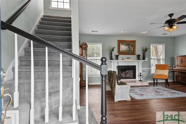 interior space featuring hardwood / wood-style flooring and ceiling fan