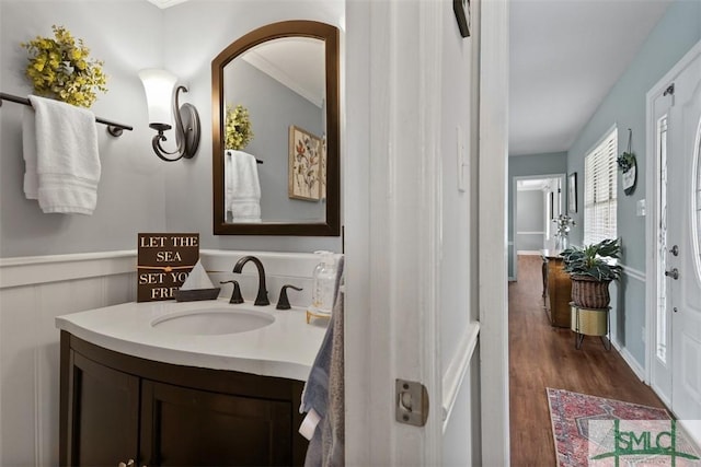 bathroom featuring vanity and hardwood / wood-style floors