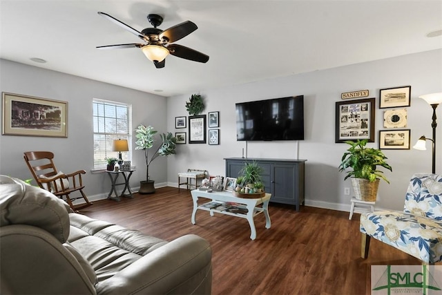 living room with dark hardwood / wood-style floors and ceiling fan