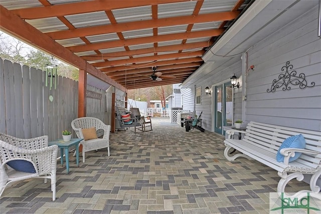 view of patio / terrace featuring ceiling fan