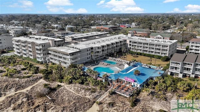 404 Butler Ave Unit 614, Tybee Island, GA 31328 - aerial view of a pool area and a tree filled landscape