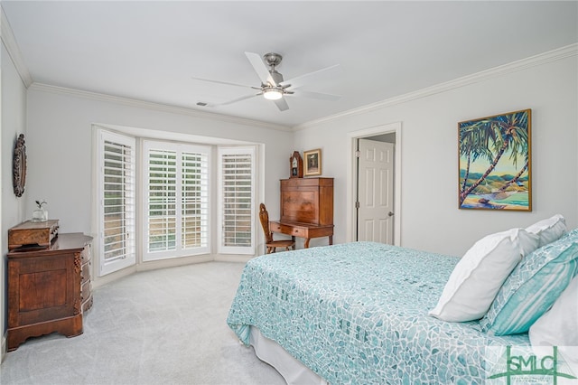 bedroom featuring crown molding, ceiling fan, and light carpet