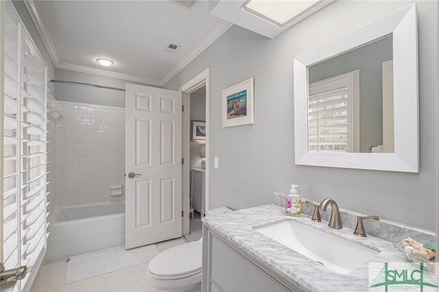 full bathroom featuring toilet, ornamental molding, vanity, tiled shower / bath combo, and tile patterned flooring