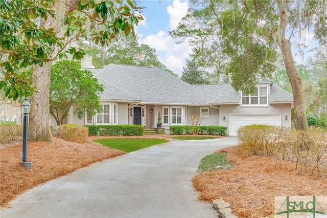 view of front of property with a garage