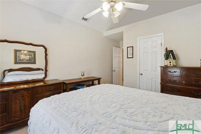 bedroom with vaulted ceiling and ceiling fan