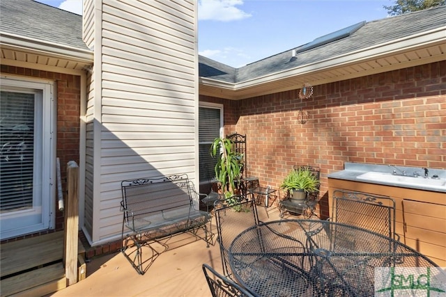 view of patio featuring a hot tub