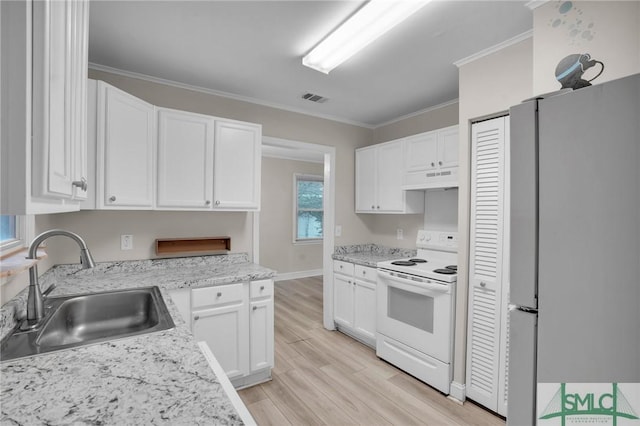 kitchen featuring white cabinetry, sink, stainless steel fridge, ornamental molding, and white range with electric cooktop