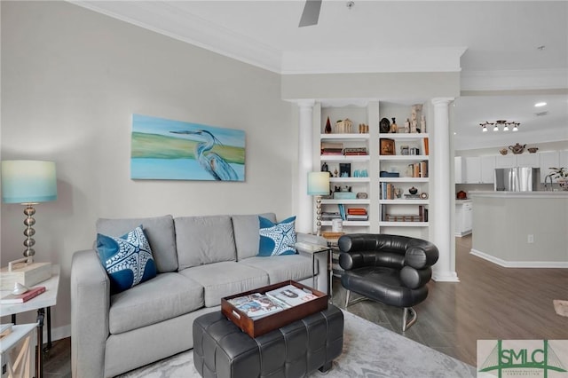 living room with hardwood / wood-style floors, ornamental molding, decorative columns, and ceiling fan