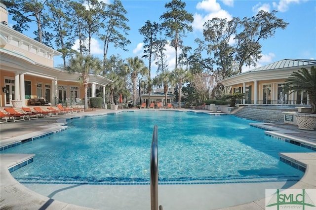 view of swimming pool featuring a patio