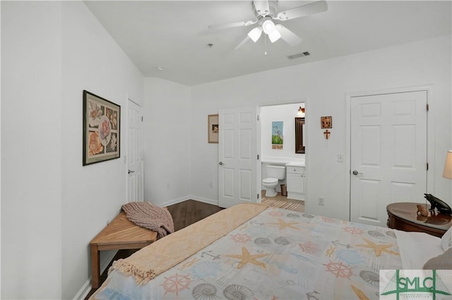 bedroom featuring ceiling fan and ensuite bathroom