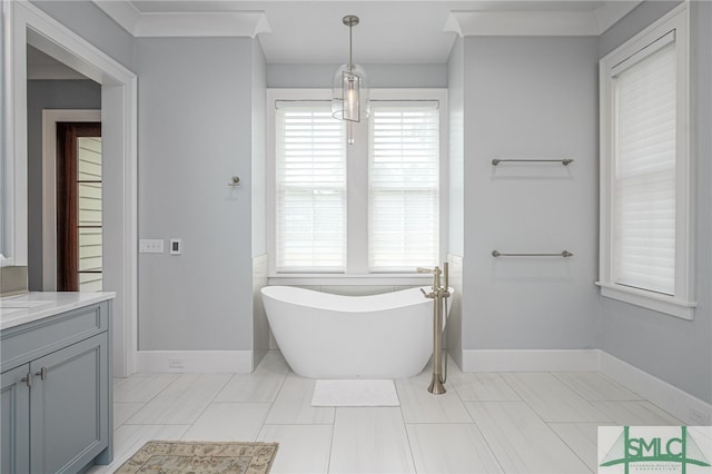 bathroom with vanity and a tub to relax in