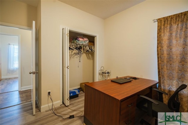 office space featuring light hardwood / wood-style floors