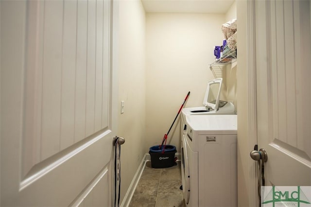 laundry room featuring washer and clothes dryer