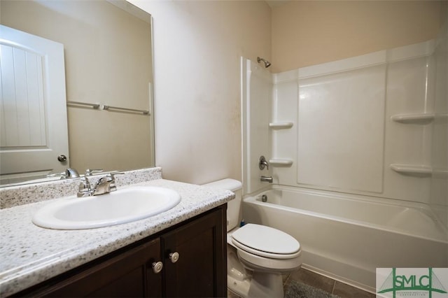 full bathroom with vanity, shower / tub combination, and toilet