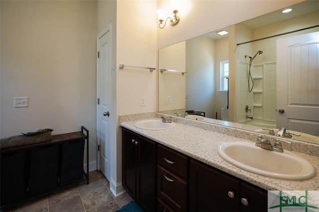 bathroom with vanity and tub / shower combination