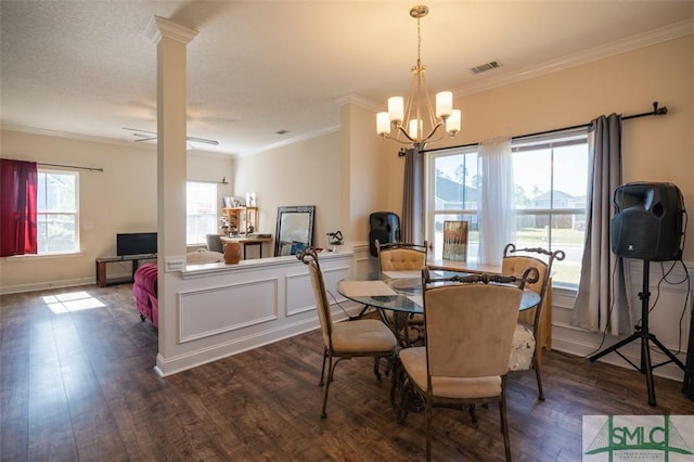 dining space featuring a notable chandelier, crown molding, and dark hardwood / wood-style floors