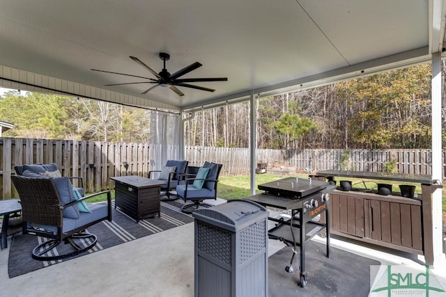 exterior space featuring ceiling fan