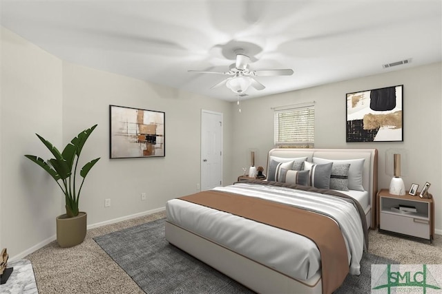 carpeted bedroom featuring ceiling fan