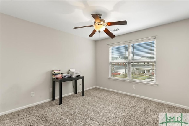 interior space with ceiling fan