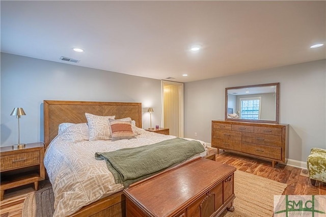 bedroom featuring hardwood / wood-style floors