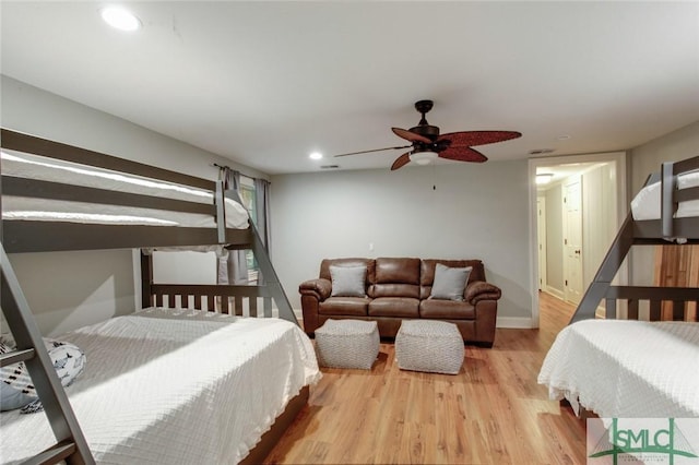 bedroom featuring ceiling fan and light hardwood / wood-style floors