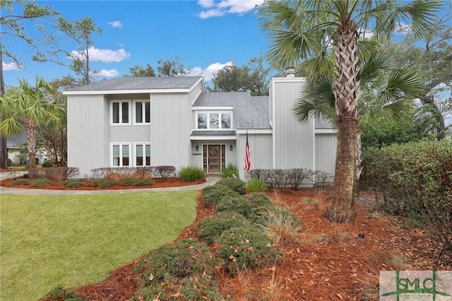 view of front of home with a front yard