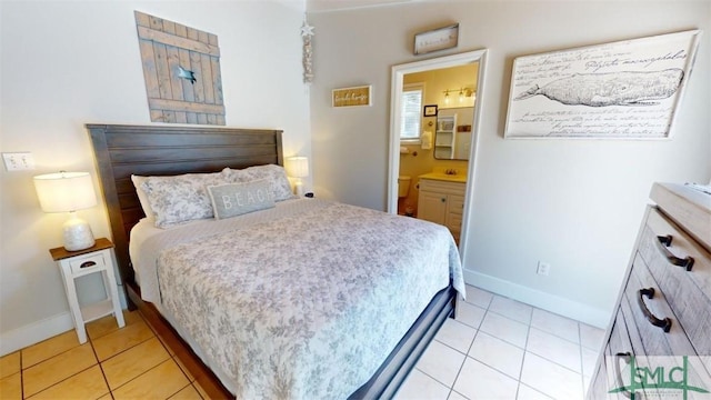 403 13th St, Tybee Island, GA 31328 - tiled bedroom with connected bathroom