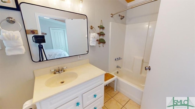403 13th St, Tybee Island, GA 31328 - bathroom with tile patterned floors, vanity, and shower / bathing tub combination