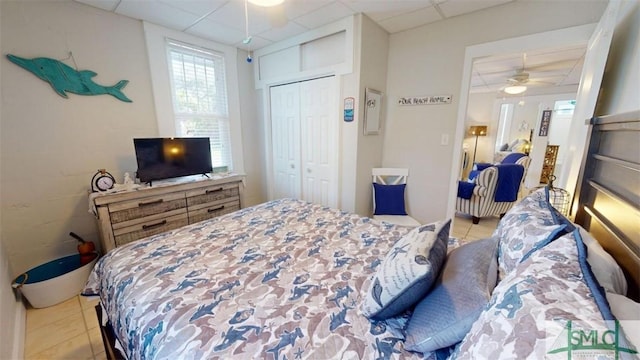 403 13th St, Tybee Island, GA 31328 - tiled bedroom with a closet and a drop ceiling
