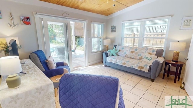 403 13th St, Tybee Island, GA 31328 - living room featuring light tile patterned flooring, lofted ceiling, and wooden ceiling
