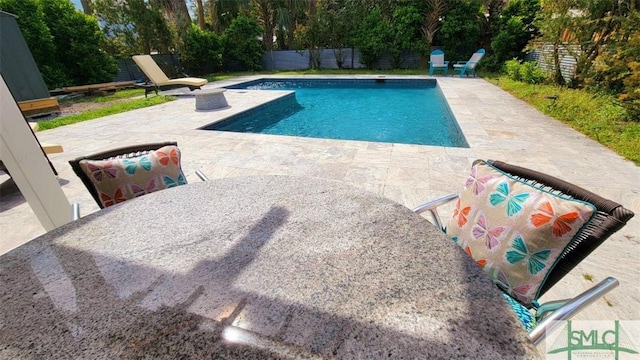 403 13th St, Tybee Island, GA 31328 - view of swimming pool featuring a patio area