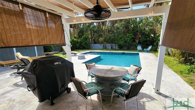 403 13th St, Tybee Island, GA 31328 - view of pool featuring a patio, area for grilling, and ceiling fan