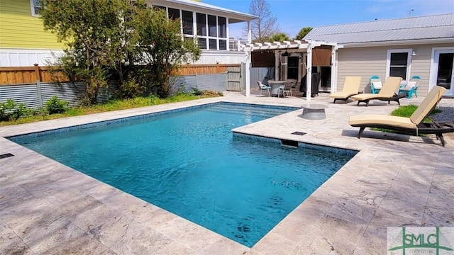 403 13th St, Tybee Island, GA 31328 - view of pool with a pergola and a patio area