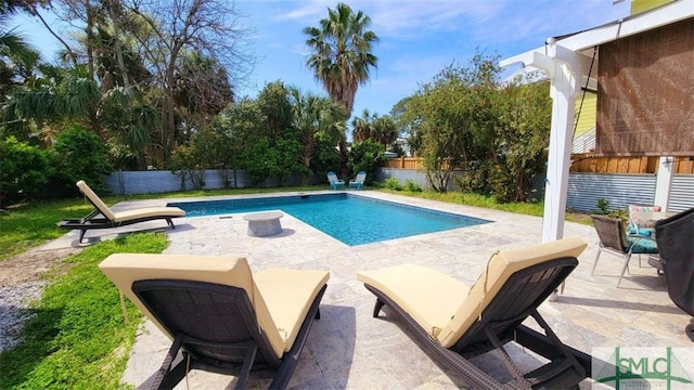 403 13th St, Tybee Island, GA 31328 - view of swimming pool with a patio area