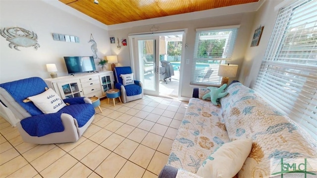 403 13th St, Tybee Island, GA 31328 - tiled living room with lofted ceiling and wood ceiling
