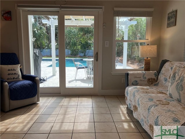 403 13th St, Tybee Island, GA 31328 - doorway to outside with light tile patterned floors