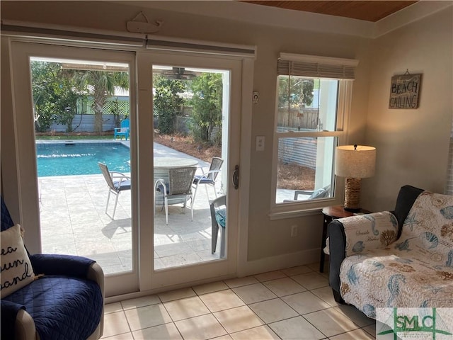 403 13th St, Tybee Island, GA 31328 - doorway featuring plenty of natural light and light tile patterned flooring