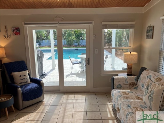 403 13th St, Tybee Island, GA 31328 - entryway featuring wooden ceiling and light tile patterned floors
