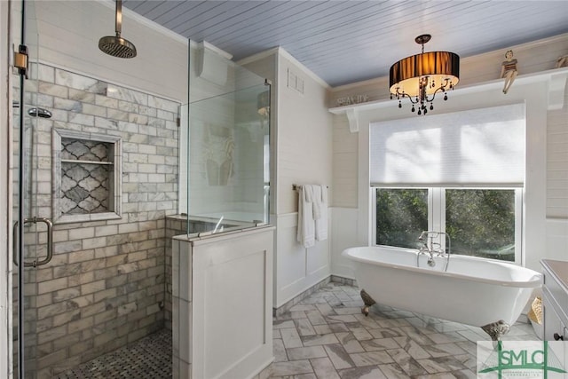 bathroom with plus walk in shower and crown molding