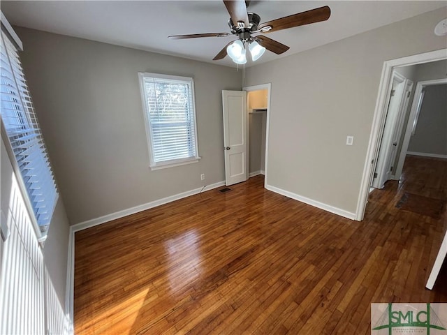 unfurnished bedroom featuring hardwood / wood-style flooring and ceiling fan