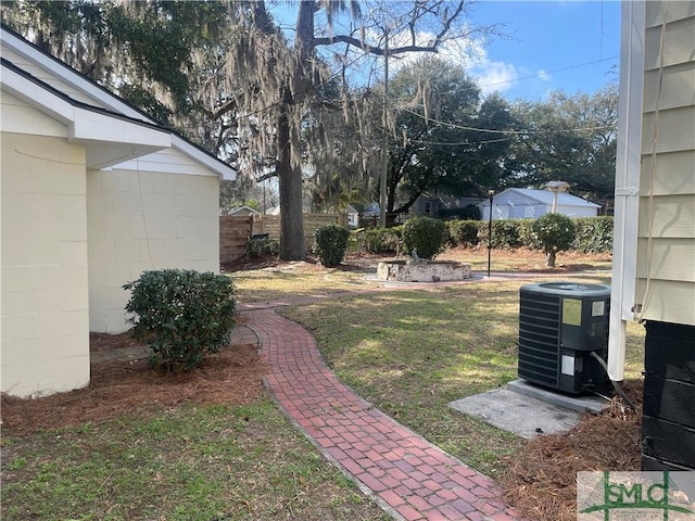 view of yard with central AC