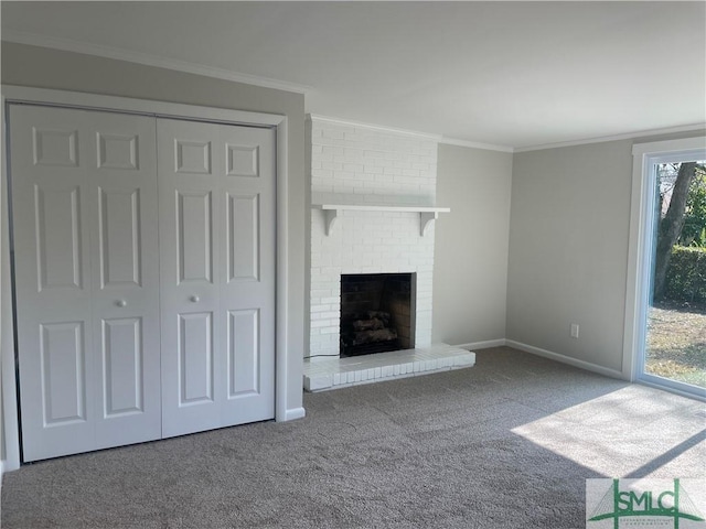 unfurnished living room with ornamental molding, a fireplace, and carpet floors