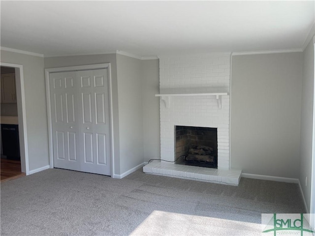 unfurnished living room featuring a brick fireplace, carpet floors, and ornamental molding