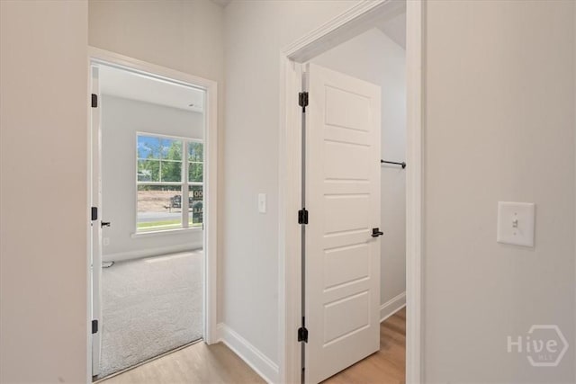 330 Crosswinds Dr, Rincon, GA 31326 - hall featuring light wood finished floors and baseboards