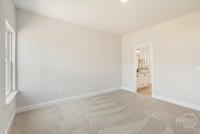 330 Crosswinds Dr, Rincon, GA 31326 - spare room with light colored carpet and baseboards
